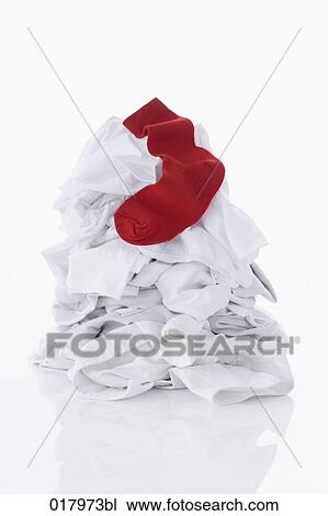 pile of white laundry with one red sock View Large Photo Image Stock Image - pile of white laundry with one red sock. Fotosearch