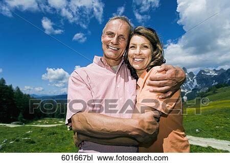 portrait of mature couple in in the mountains View Large Photo Image Stock Image - portrait of mature couple in in the mountains. Fotosearch
