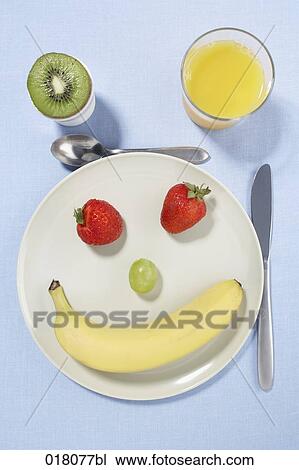 still life different fruits on plate forming smiling face View Large Photo Image Stock Image - still life different fruits on plate forming smiling face. Fotosearch