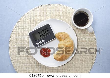still life of breakfast with croissant coffee and alarm clock View Large Photo Image Stock Image - still life of breakfast with croissant coffee and alarm clock. Fotosearch