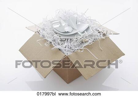 still life of broken crockery coming out of cardboard box View Large Photo Image Stock Image - still life of broken crockery coming out of cardboard box. Fotosearch