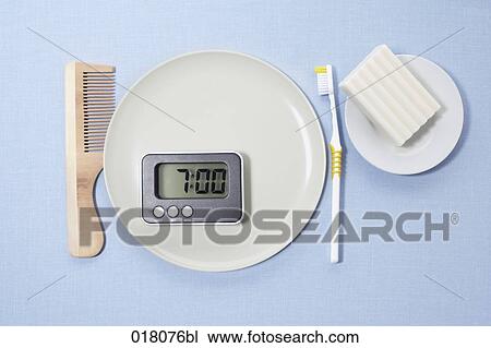 still life of comb alarm clock toothbrush and soap on plate View Large Photo Image Stock Image - still life of comb alarm clock toothbrush and soap on plate. Fotosearch