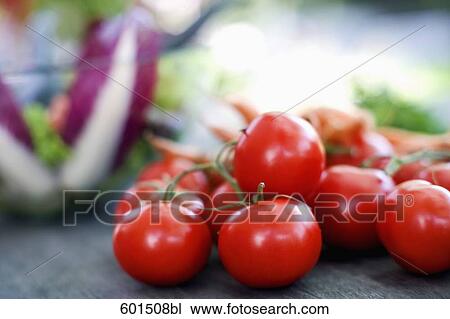 still life of fresh tomatoes View Large Photo Image Stock Image - still life of fresh tomatoes. Fotosearch