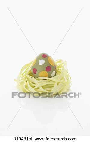 still life of painted egg in paper nest View Large Photo Image Stock Image - still life of painted egg in paper nest. Fotosearch
