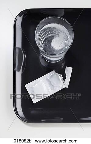 still life of tablet in glass of water View Large Photo Image Stock Image - still life of tablet in glass of water. Fotosearch