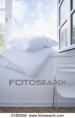 still life of white pillow and duvet on window sill View Large Photo Image Stock Image - still life of white pillow and duvet on window sill. Fotosearch