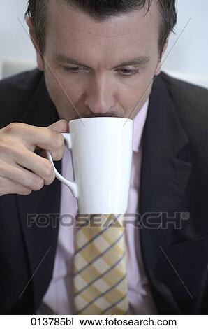 businessman drinking coffee View Large Photo Image Stock Image - businessman drinking coffee. Fotosearch