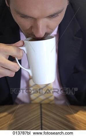 businessman drinking tea View Large Photo Image Stock Image - businessman drinking tea. Fotosearch