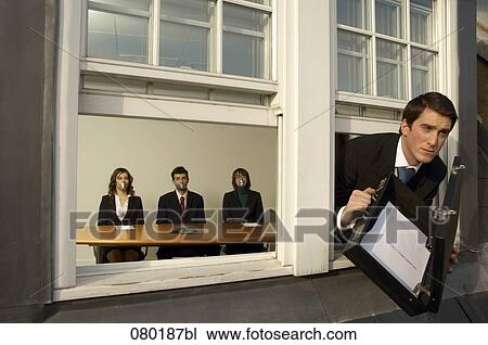 businessman leaving office building through window with confidential documents View Large Photo Image Stock Image - businessman leaving office building through window with confidential documents. Fotosearch