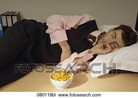 businessman sleeping on his desk sucking thumb View Large Photo Image Stock Image - businessman sleeping on his desk sucking thumb. Fotosearch