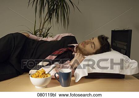 businessman sleeping on his desk View Large Photo Image Stock Image - businessman sleeping on his desk. Fotosearch