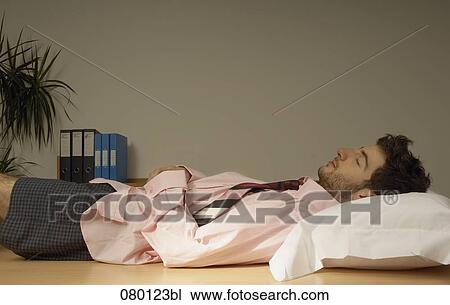 businessman sleeping on his desk View Large Photo Image Stock Image - businessman sleeping on his desk. Fotosearch