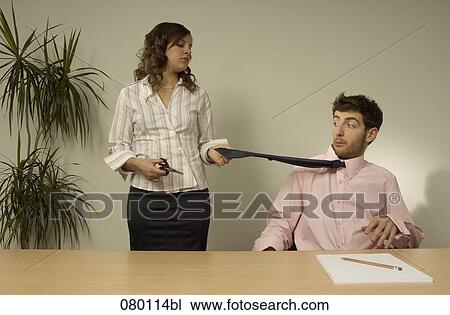 businesswoman pulling tie of male colleague View Large Photo Image Stock Image - businesswoman pulling tie of male colleague. Fotosearch