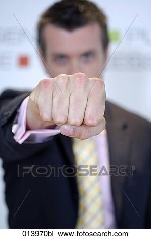Stock Image - close-up of businessman´s fist. Fotosearch