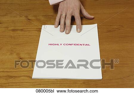 close-up of businessman´s hand grabbing for confidential document View Large Photo Image Stock Image - close-up of businessman´s hand grabbing for confidential document. Fotosearch
