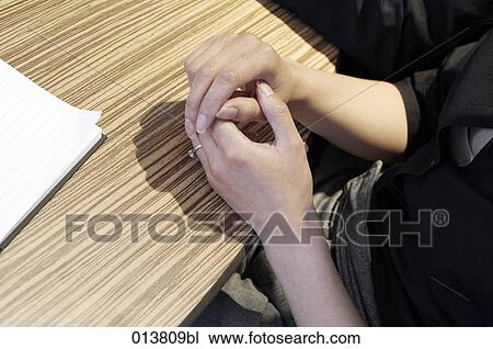 close-up of female hands on conference table View Large Photo Image Stock Image - close-up of female hands on conference table. Fotosearch