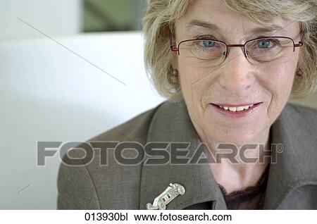close-up portrait of eldery woman with spectacles smiling View Large Photo Image Stock Image - close-up portrait of eldery woman with spectacles smiling. Fotosearch