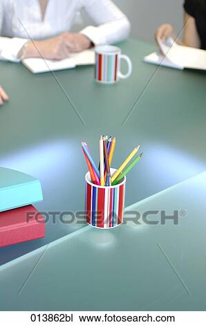cup with colourful pencils on conference table during business meeting View Large Photo Image Stock Image - cup with colourful pencils on conference table during business meeting. Fotosearch