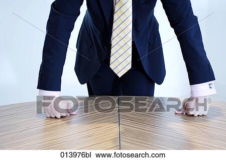 detail of businessman in suit leaning on table View Large Photo Image Stock Image - detail of businessman in suit leaning on table. Fotosearch