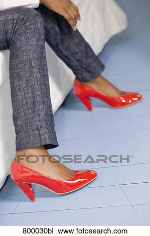 detail of woman´s legs with red high heel shoes View Large Photo Image Stock Image - detail of woman´s legs with red high heel shoes. Fotosearch