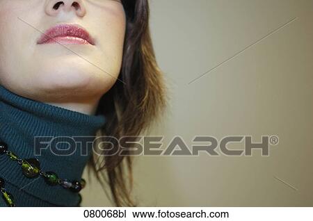 Stock Image - detail of young woman wearing rollneck. Fotosearch