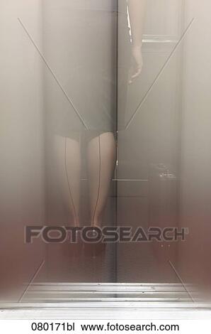 double exposure of businesswoman with seamed stockings standing in elevator View Large Photo Image Stock Image - double exposure of businesswoman with seamed stockings standing in elevator. Fotosearch