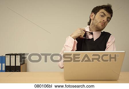 frustrated businessman loosening his tie View Large Photo Image Stock Image - frustrated businessman loosening his tie. Fotosearch