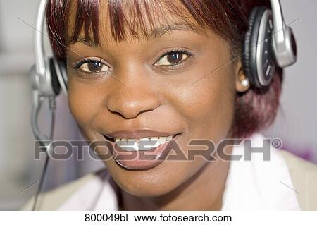 headshot of black businesswoman wearing headset View Large Photo Image Stock Image - headshot of black businesswoman wearing headset. Fotosearch