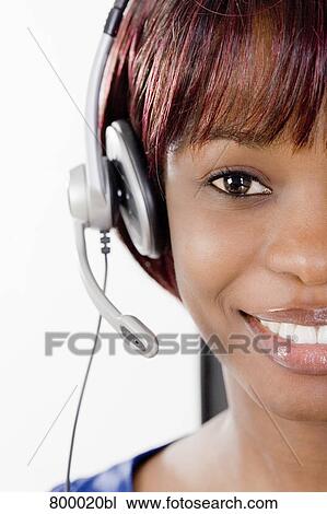 headshot of black call center agent wearing headset View Large Photo Image Stock Image - headshot of black call center agent wearing headset. Fotosearch