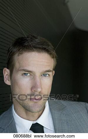 headshot of business wearing tie and suit View Large Photo Image Stock Image - headshot of business wearing tie and suit. Fotosearch