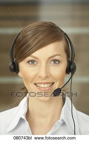 headshot of female call center agent View Large Photo Image Stock Image - headshot of female call center agent. Fotosearch
