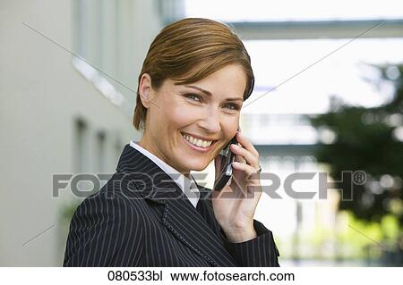 headshot of mature businesswoman talking on mobile phone View Large Photo Image Stock Image - headshot of mature businesswoman talking on mobile phone. Fotosearch