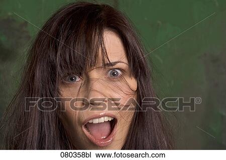 headshot of shocked young businesswoman View Large Photo Image Stock Image - headshot of shocked young businesswoman. Fotosearch