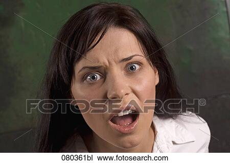 headshot of shocked young businesswoman View Large Photo Image Stock Image - headshot of shocked young businesswoman. Fotosearch