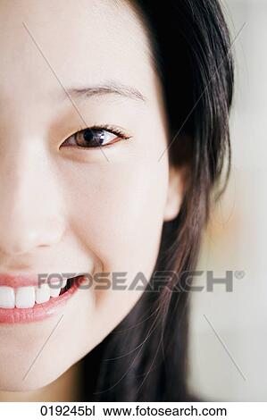 Stock Image - headshot of young japanese girl. Fotosearch