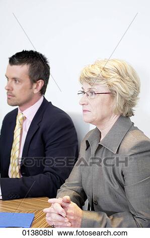 mature businesswoman and male colleague in conference View Large Photo Image Stock Image - mature businesswoman and male colleague in conference. Fotosearch