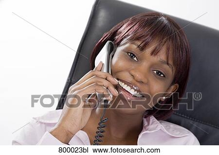 portrait of black businesswoman with telephone View Large Photo Image Stock Image - portrait of black businesswoman with telephone. Fotosearch