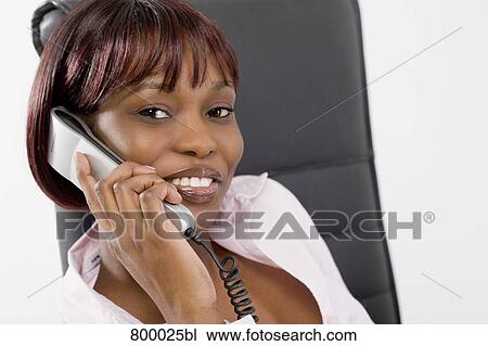 portrait of black businesswoman with telephone View Large Photo Image Stock Image - portrait of black businesswoman with telephone. Fotosearch