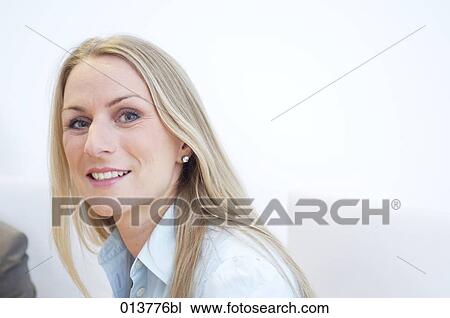 portrait of blond businesswoman during meeting View Large Photo Image Stock Image - portrait of blond businesswoman during meeting. Fotosearch