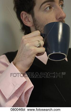 portrait of businessman holding mug View Large Photo Image Stock Image - portrait of businessman holding mug. Fotosearch
