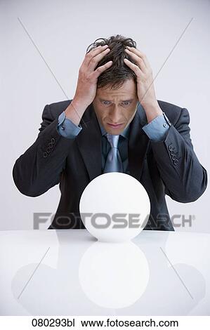 portrait of businessman shocked by look into crystal ball View Large Photo Image Stock Image - portrait of businessman shocked by look into crystal ball. Fotosearch