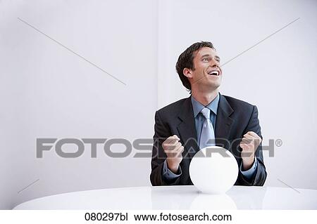 portrait of businessman with crystal ball celebrating success View Large Photo Image Stock Image - portrait of businessman with crystal ball celebrating success. Fotosearch
