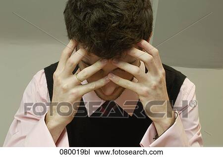 portrait of depressed businessman holding head in hands View Large Photo Image Stock Image - portrait of depressed businessman holding head in hands. Fotosearch