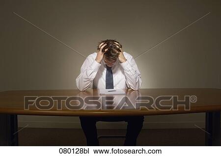 portrait of desperate businessman holding head in hands View Large Photo Image Stock Image - portrait of desperate businessman holding head in hands. Fotosearch