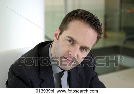 portrait of executive listening during meeting View Large Photo Image Stock Image - portrait of executive listening during meeting. Fotosearch