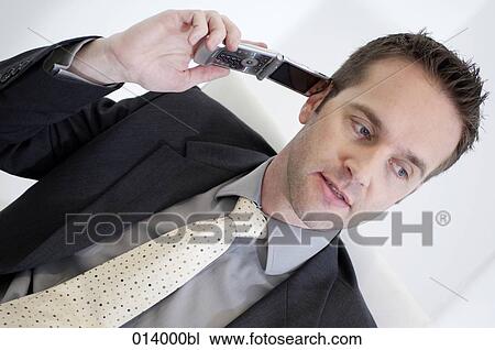 portrait of executive with mobile phone View Large Photo Image Stock Image - portrait of executive with mobile phone. Fotosearch