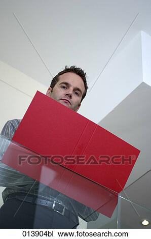 portrait of executive with red folder View Large Photo Image Stock Image - portrait of executive with red folder. Fotosearch
