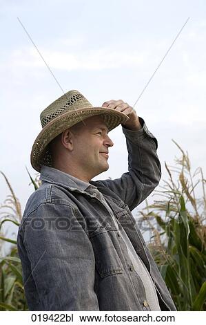 portrait of farmer wearing hat View Large Photo Image Stock Image - portrait of farmer wearing hat. Fotosearch