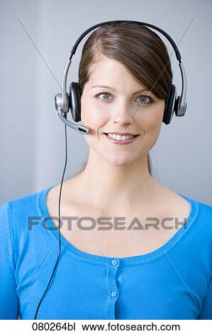 portrait of female call center agent with headset View Large Photo Image Stock Image - portrait of female call center agent with headset. Fotosearch