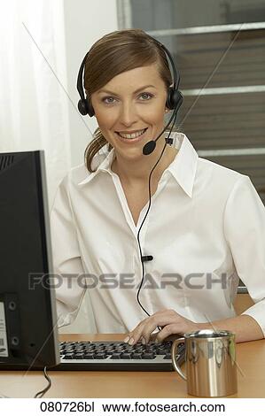 portrait of female call center agent wearing headset View Large Photo Image Stock Image - portrait of female call center agent wearing headset. Fotosearch
